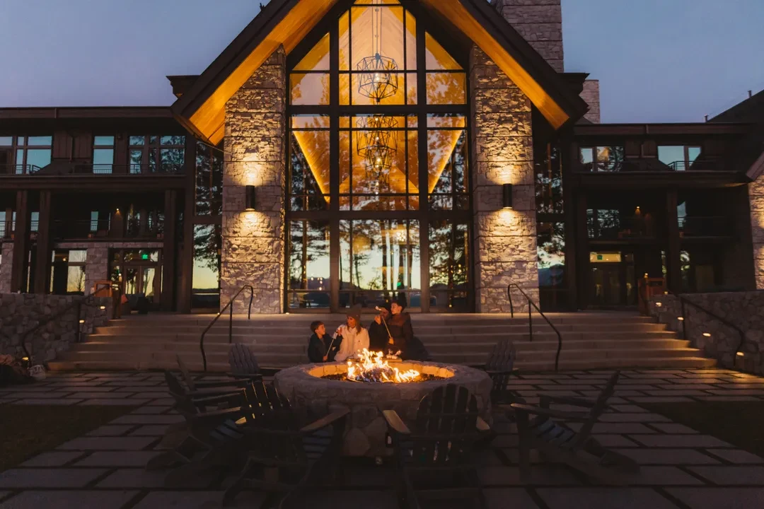 Guests gathered around the Edgewood fire terrace at dusk