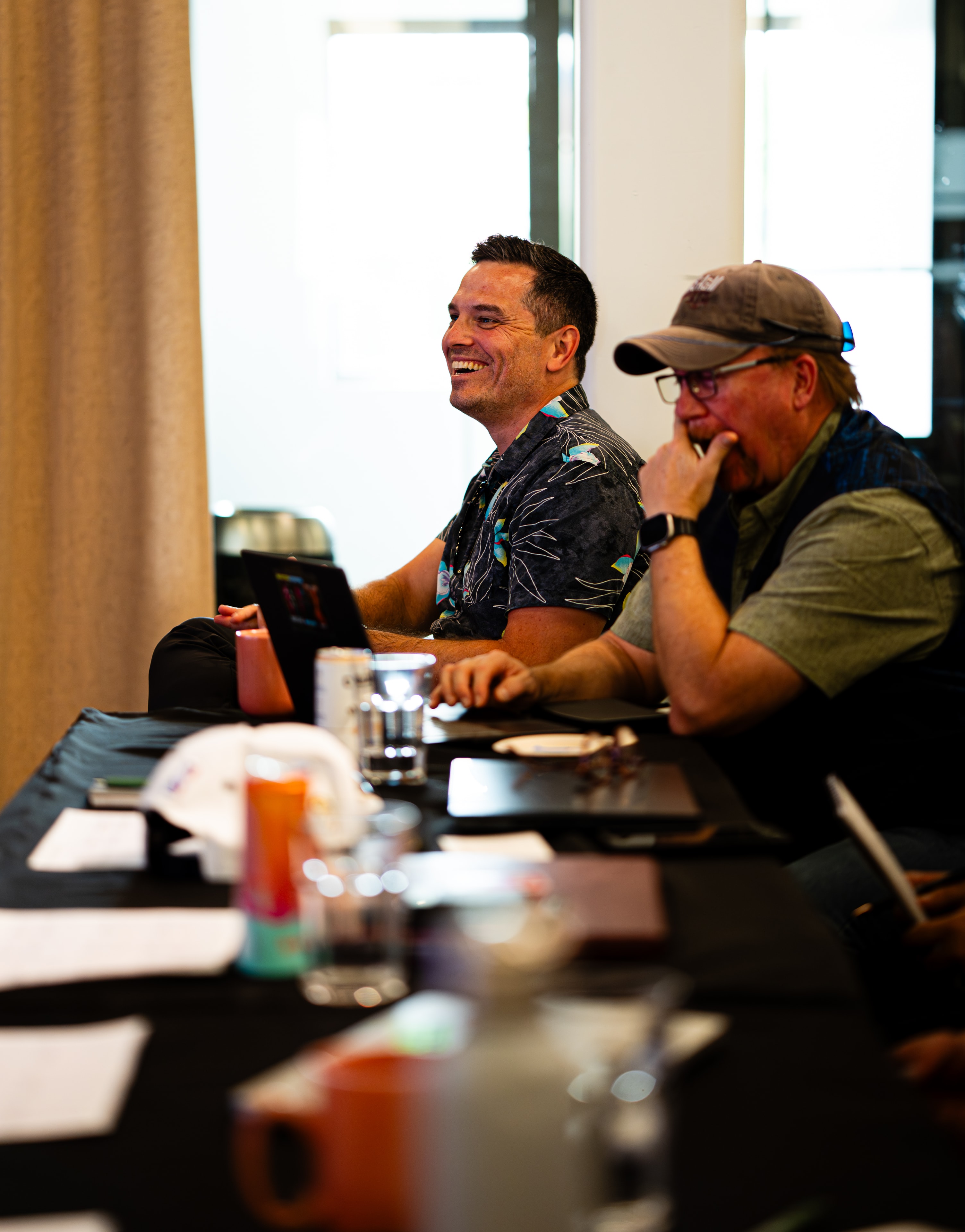 Two members sharing a laugh during the session